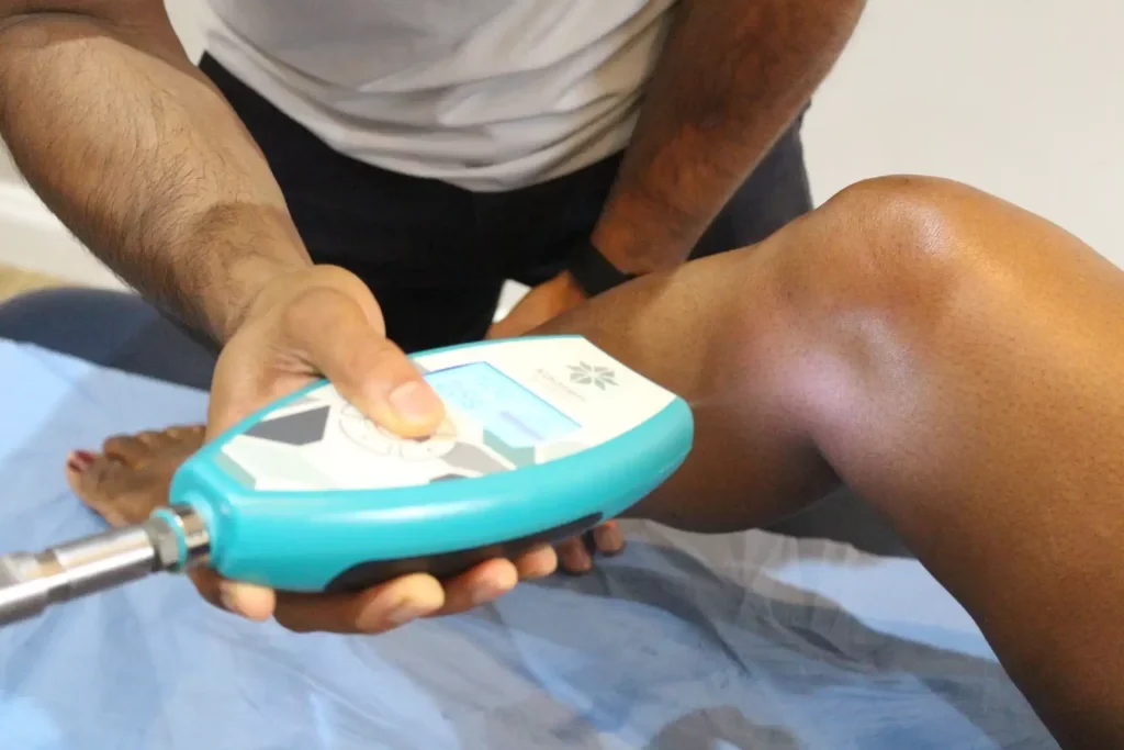 A cold applicator working on a knee