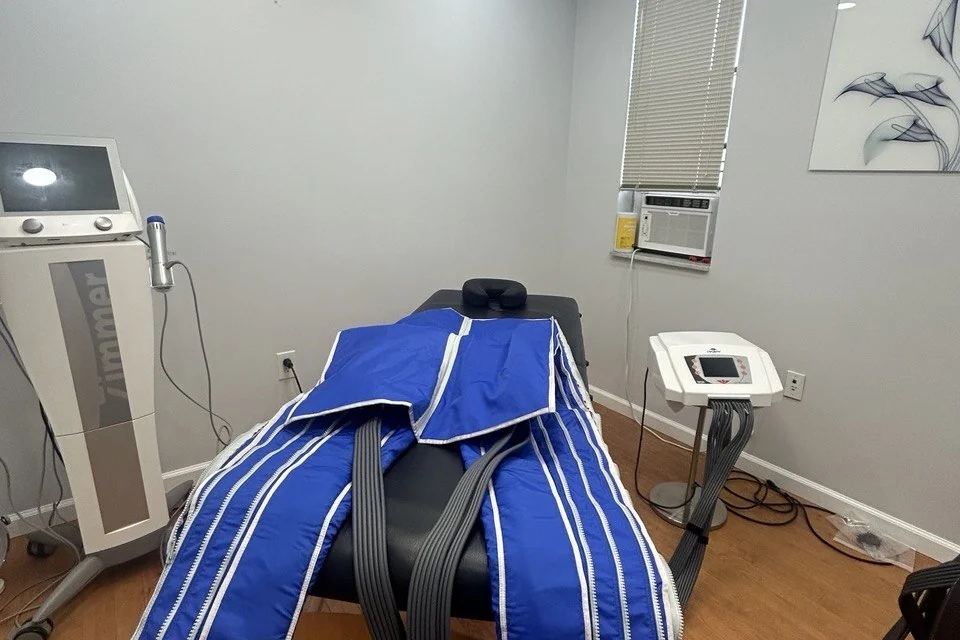 The compression suit and its pump in our Creve Coeur treatment room